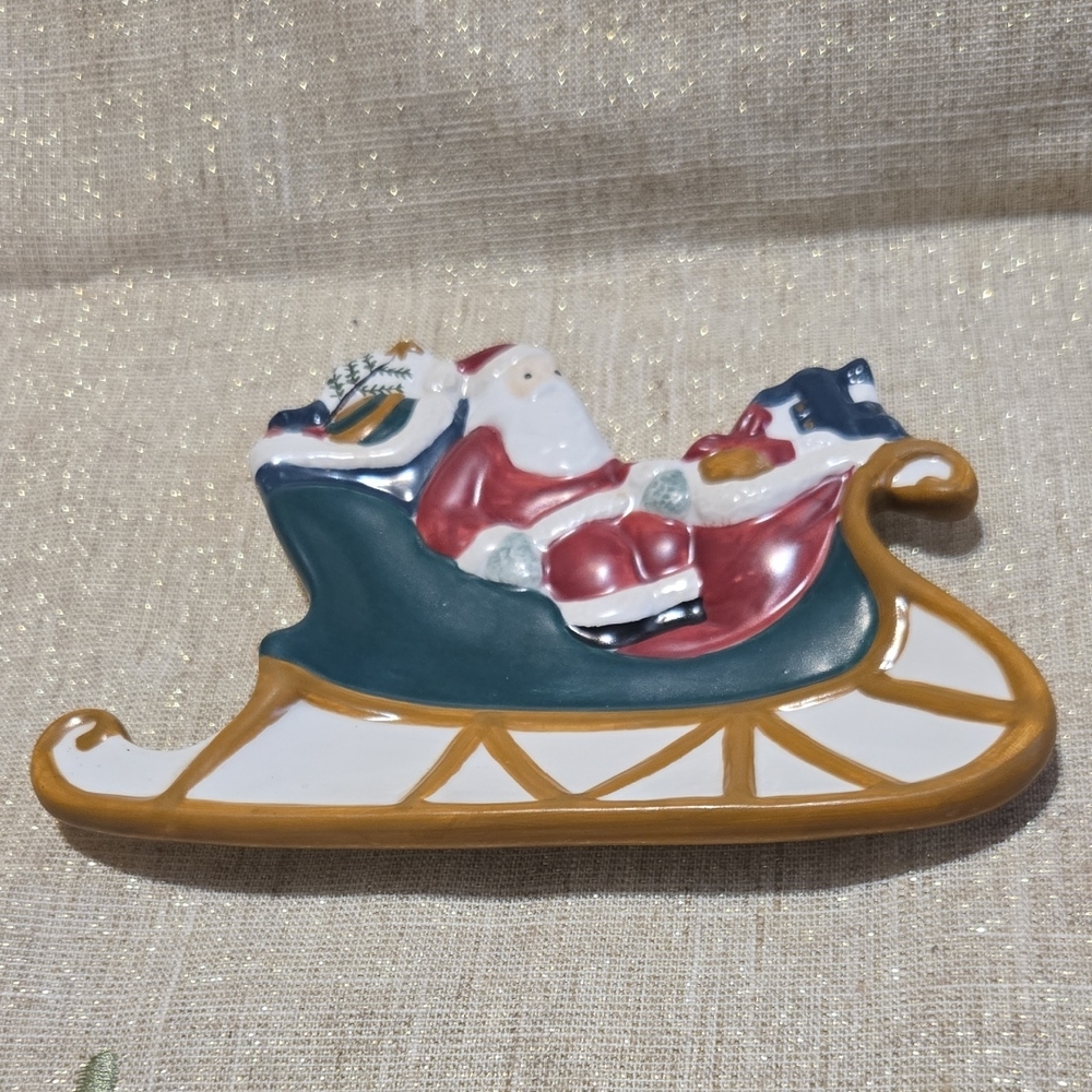 Sakura China Santa Sleigh Ceramic Decor. Approx 6in In Length, 5in Tall.